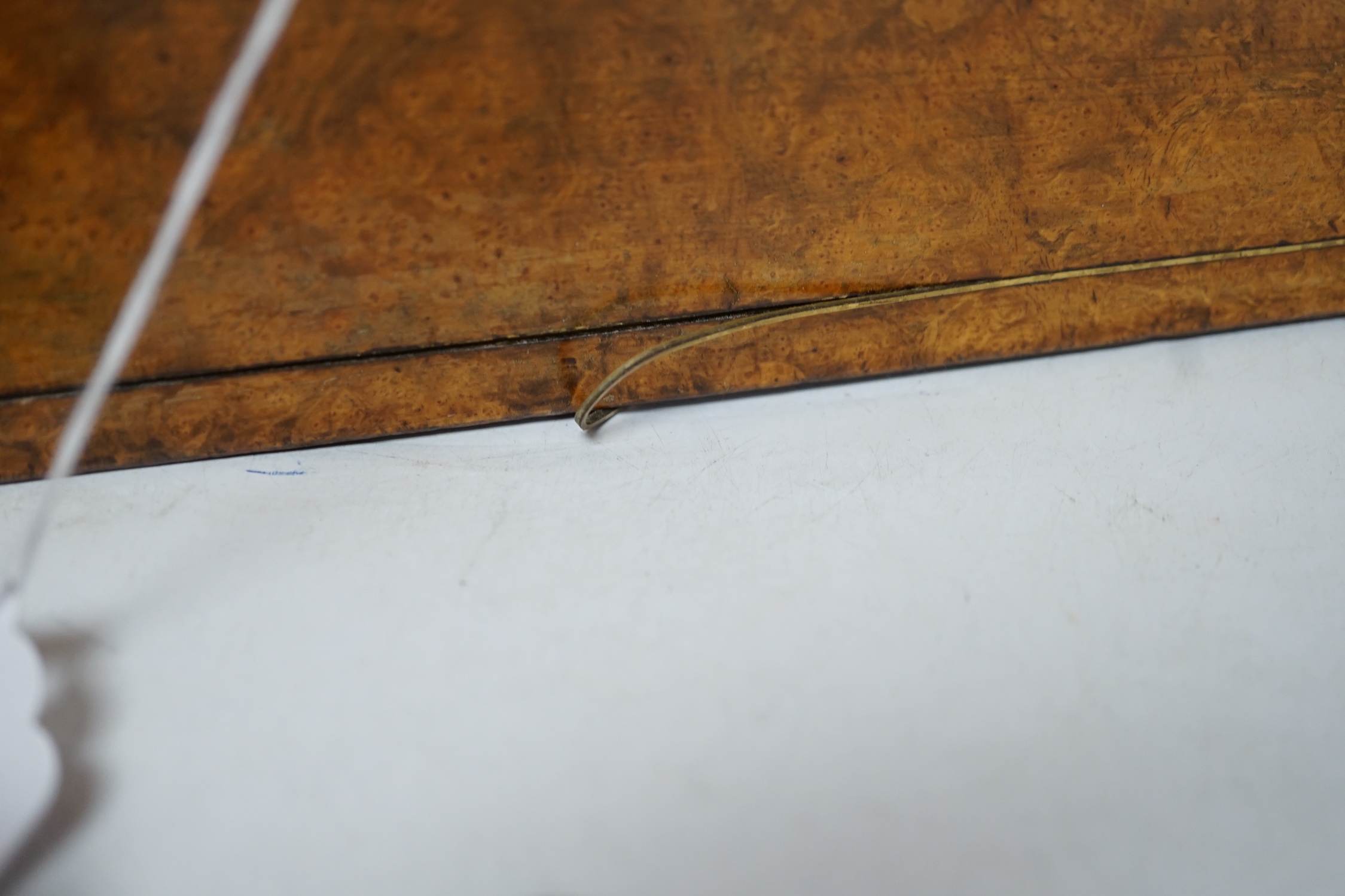 A 19th century brass inlaid burr walnut writing box, 34cm wide